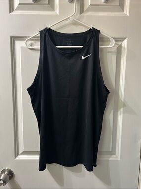 Nike women’s Black Athletic Tank with White Swoosh Logo